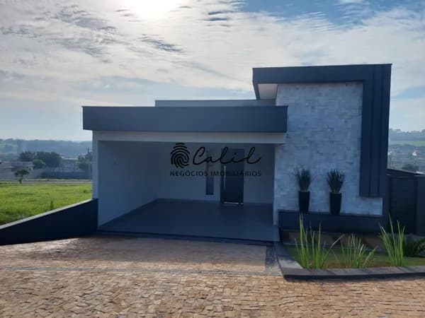 Casa térrea com 3 suítes, 144m² à venda por R$ 810.000,00 - Condomínio Terras deSanta Martha, Ribeirão Preto/SP