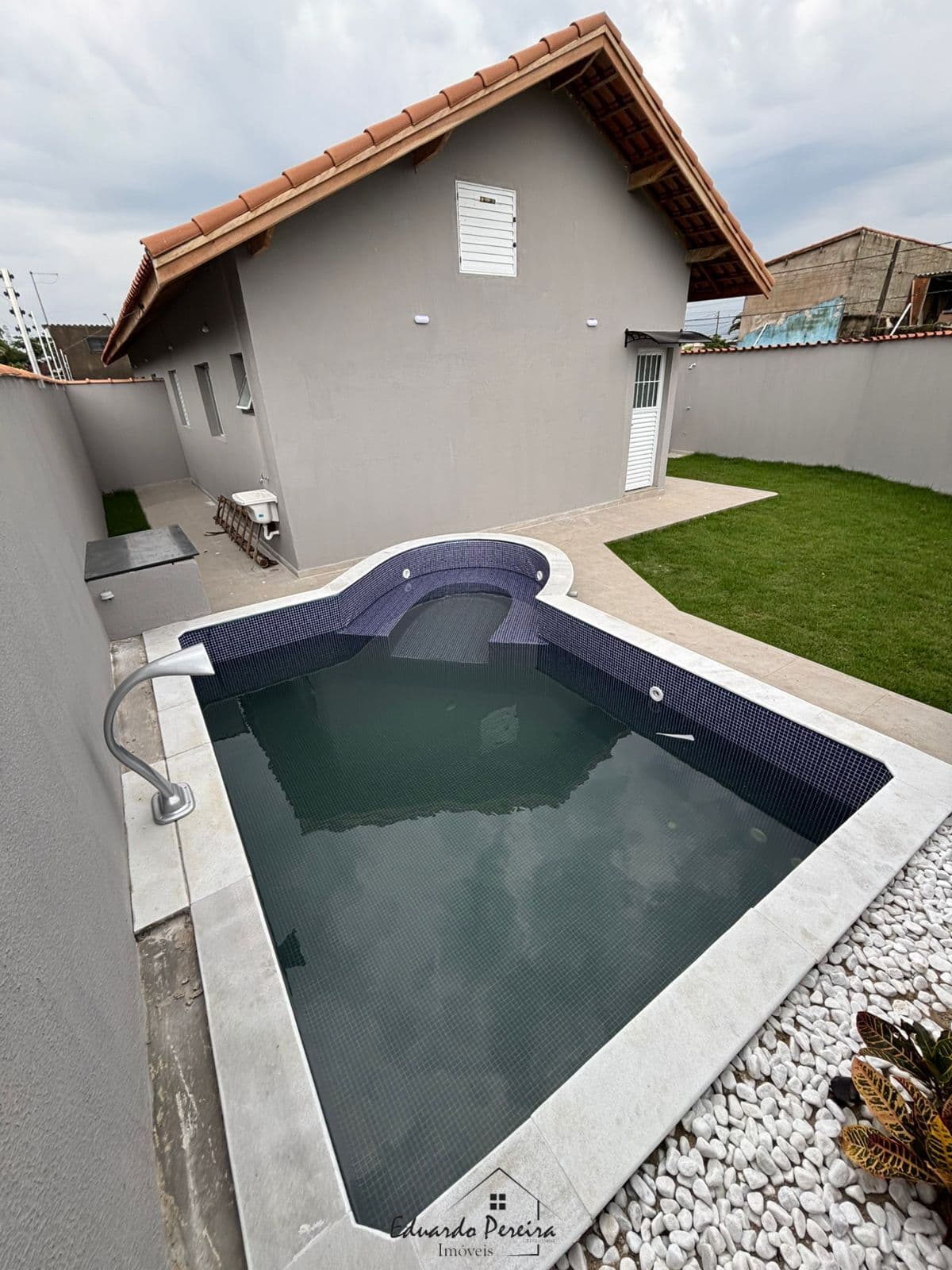 Casa a venda com piscina no bairro Jamaica - Praia, Itanhaém/SP