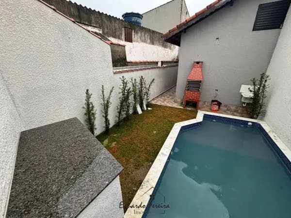 Casa á venda com churrasqueira e piscina no bairro Nossa Senhora do Sion, Itanhaém/SP
