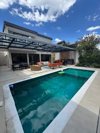 Casa Alto Padrão com 350m² com 04 suítes, piscina e área gourmet completa no Condomínio Residencial 4 - Santana de Parnaíba/SP