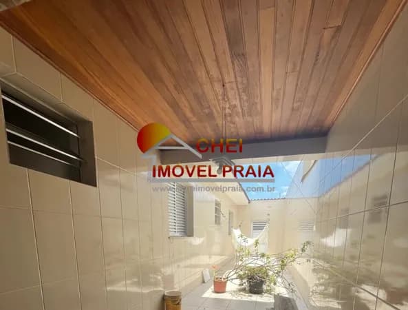 Casa com edícula