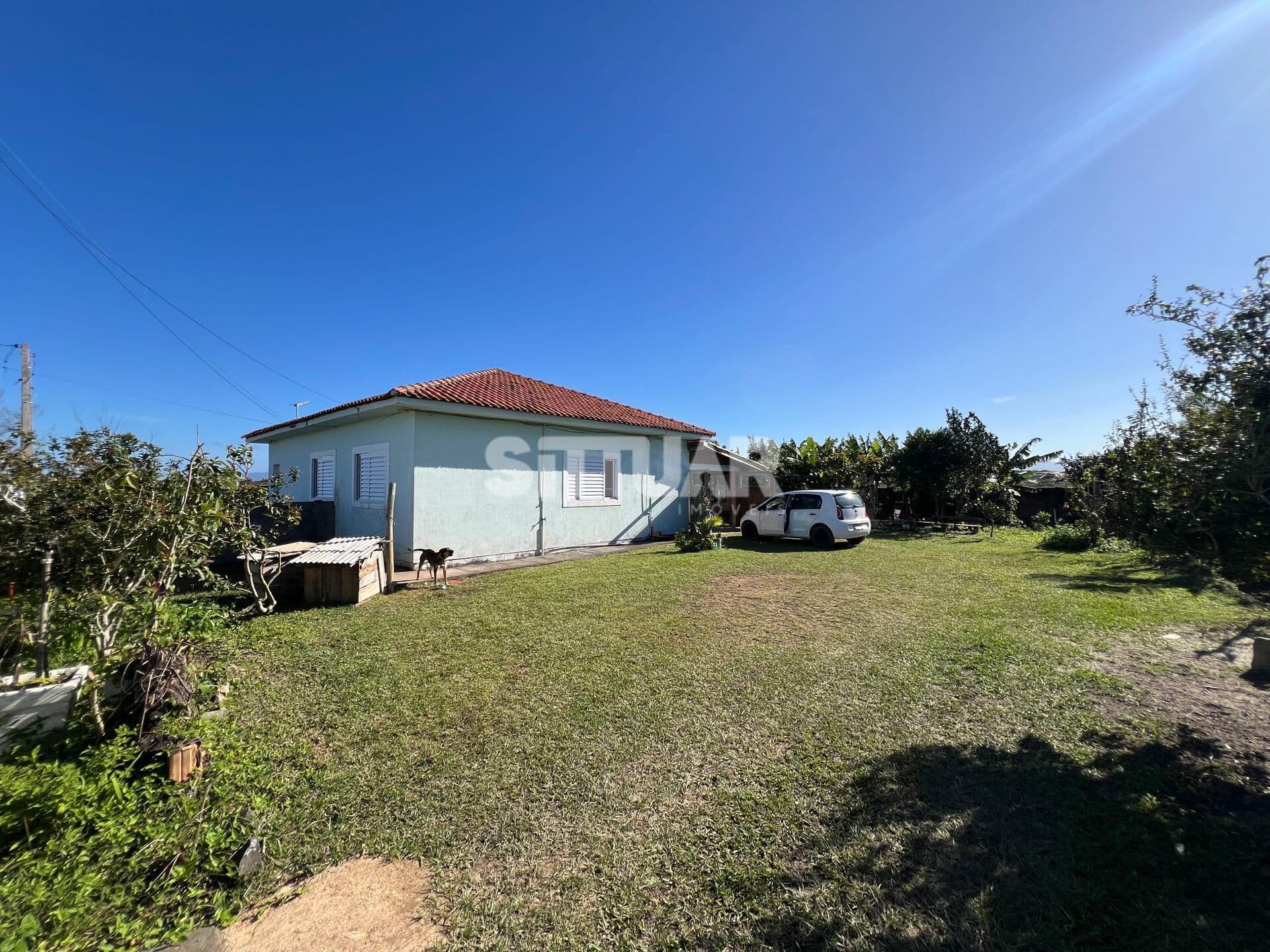 Casa com terreno amplo
