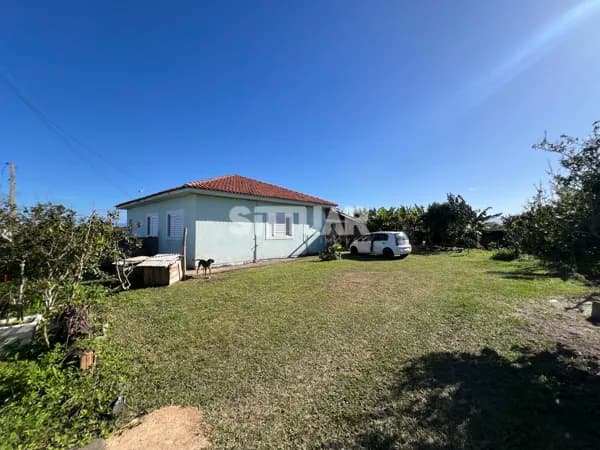 Casa com terreno amplo