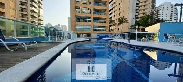 Apartamento alto padrão com acesso a sacada gourmet, 2 dormitórios climatizados sendo 1 suíte, lazer no condomínio - ASTÚRIAS -Guarujá/SP.