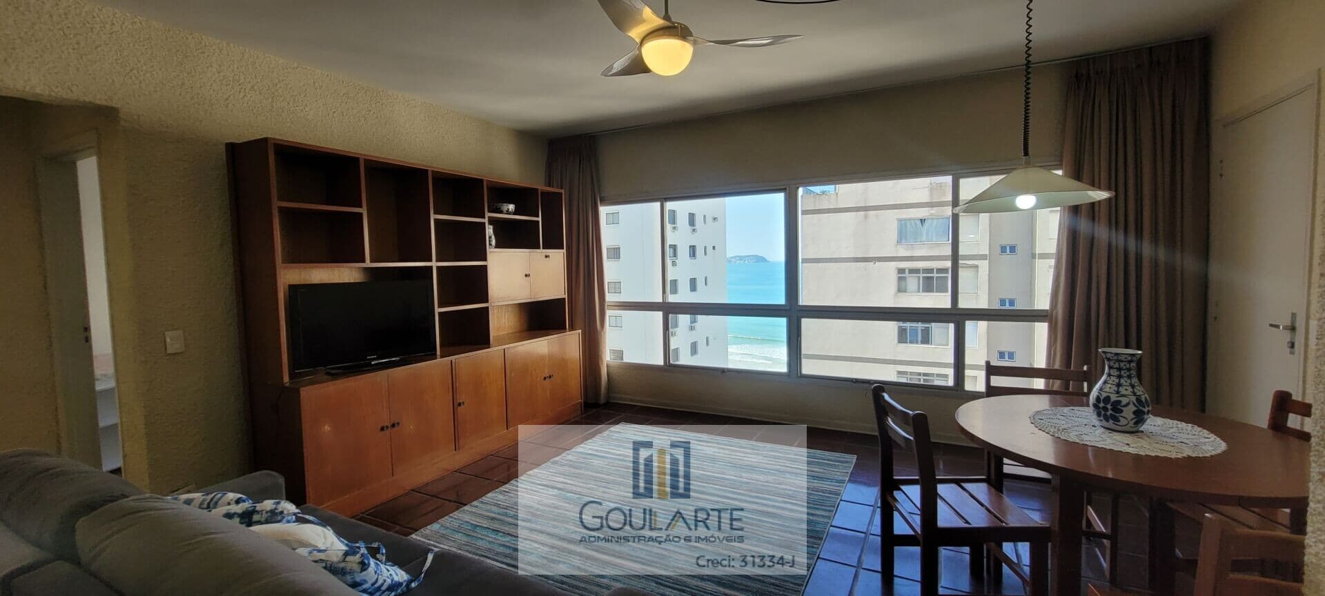 Apartamento com vista parcial do mar,2 dormitórios sendo 1 suíte + dormitório reversível na praia da Astúrias-Guarujá/SP.