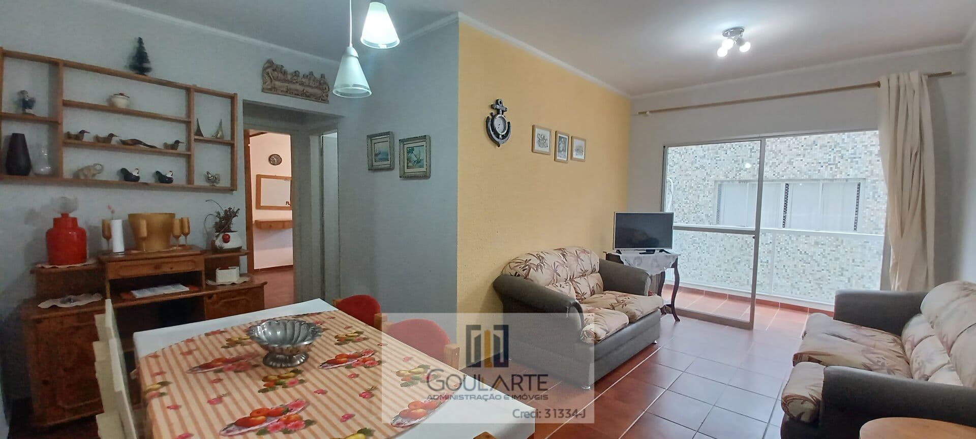 Apartamento com acesso a sacada, 3 dormitórios, lado praia - Enseada-Guarujá/SP