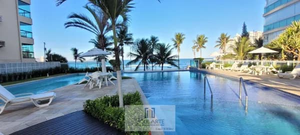 Apartamento com sacada gourmet ,2 dormitórios sendo 1 suíte, condomínio clube de frente para o mar ,ASTÚRIAS - Guarujá/SP.