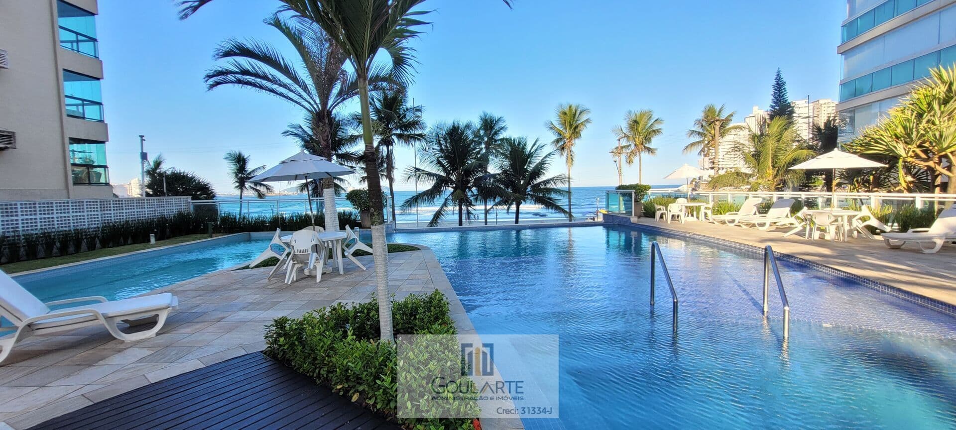 Apartamento com sacada gourmet ,2 dormitórios sendo 1 suíte, condomínio clube de frente para o mar ,ASTÚRIAS - Guarujá/SP.