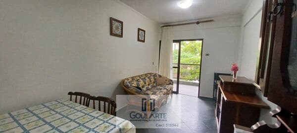 Apartamento com acesso a sacada, 2 dormitórios sendo 1 suíte, lado praia - Enseada-Guarujá/SP.