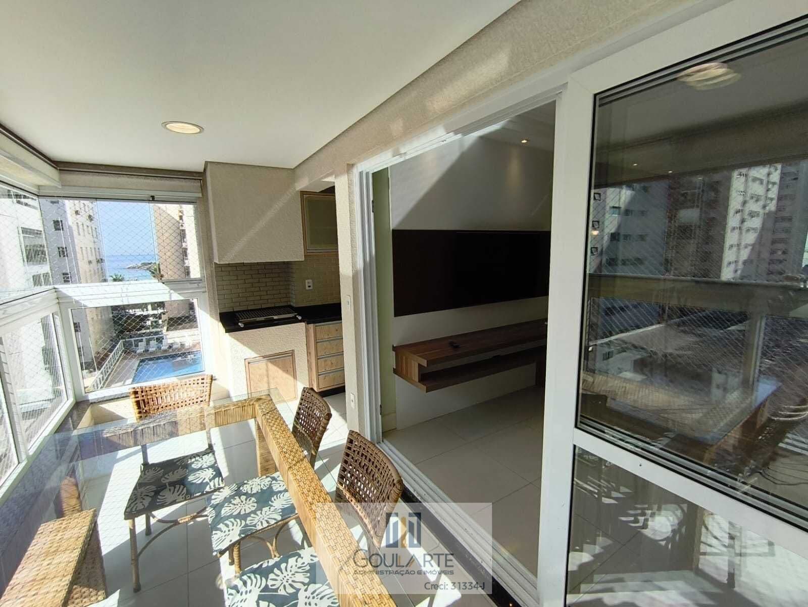Apartamento alto padrão decorado com acesso a sacada gourmet, 3 dormitórios sendo 1 suíte, lazer no condomínio e vista lateral do mar, na praia das PITANGUEIRAS - Guarujá/SP