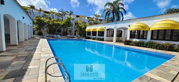 Casa triplex lado praia em condomínio clube frente mar, 3 dormitórios climatizados sendo 1 suíte na praia da ENSEADA - Guarujá/SP.