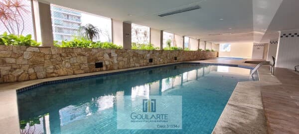 Apartamento Alto Padrão com acesso a sacada, 2 dormitórios sendo 1 suíte, lazer no condomínio, à 150 metros do mar - PITANGUEIRAS-Guarujá/SP.