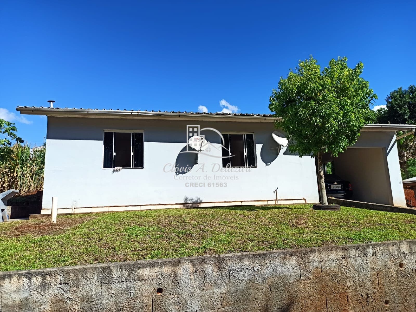 Casa em frente o lago de Itá