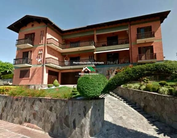 Apartamento com 3 dormitórios, suíte e sacada no Centro