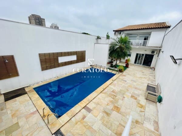 Viva com conforto e espaço: Conheça sua nova casa de alto padrão, de 5 Quartos, com 3 Vagas cobertas, área gourmet e piscina privativa na Mooca
