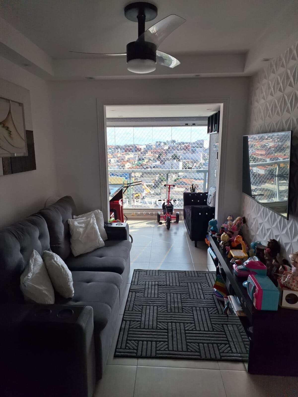 Apartamento à venda com 56 m², 2 quartos, varanda gourmet e vaga na Vila Ema, São Paulo.