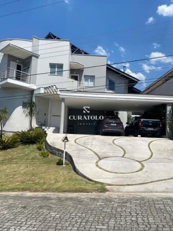 Viva com conforto e espaço: Sua nova casa em condomínio de alto padrão em Mogi – 5 Suítes, 3 Vagas e Área gourmet com Churrasqueira e Piscina