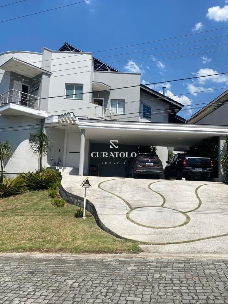 Viva com conforto e espaço: Sua nova casa em condomínio de alto padrão em Mogi – 5 Suítes, 3 Vagas e Área gourmet com Churrasqueira e Piscina