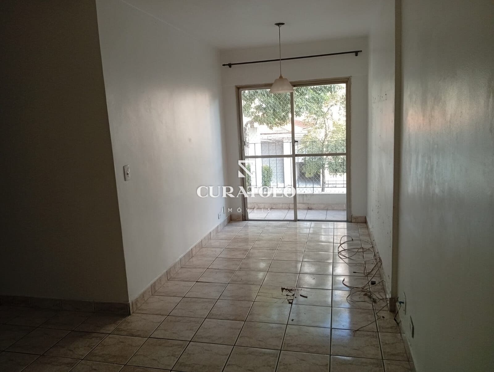 Apartamento à venda com 54m², 2 quartos, varanda e vaga, Mooca, São Paulo.