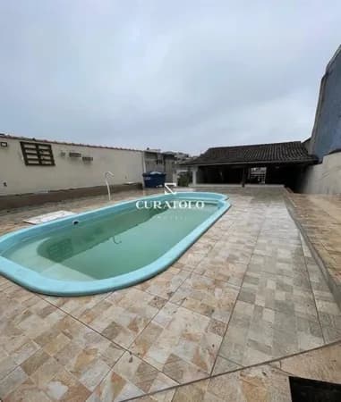 Venha conhecer a casa ideal em Santo André: Espaçoso sobrado com amplos 151m², 3 quartos e 3 vagas, quintal com churrasqueira e piscina