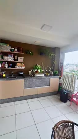 Apartamento à venda com 64 m², 2 quartos, vaga e varanda gourmet na Vila Prudente, São Paulo.