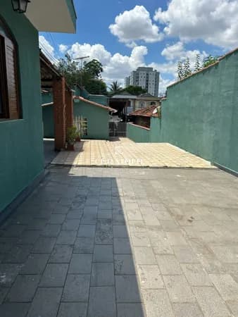Casa à venda com 3 quartos e 4 vagas no bairro Vila Bela, São Paulo.