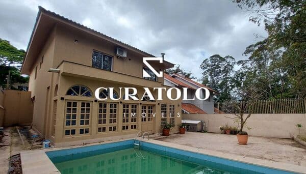 Casa em Condomínio com 4 suítes, piscina, 5 vagas - Residencial Cinco, Alphaville