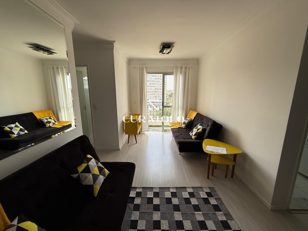 Apartamento à venda com 48 m², de 2 quartos, varanda e vaga na Vila Prudente, São Paulo.