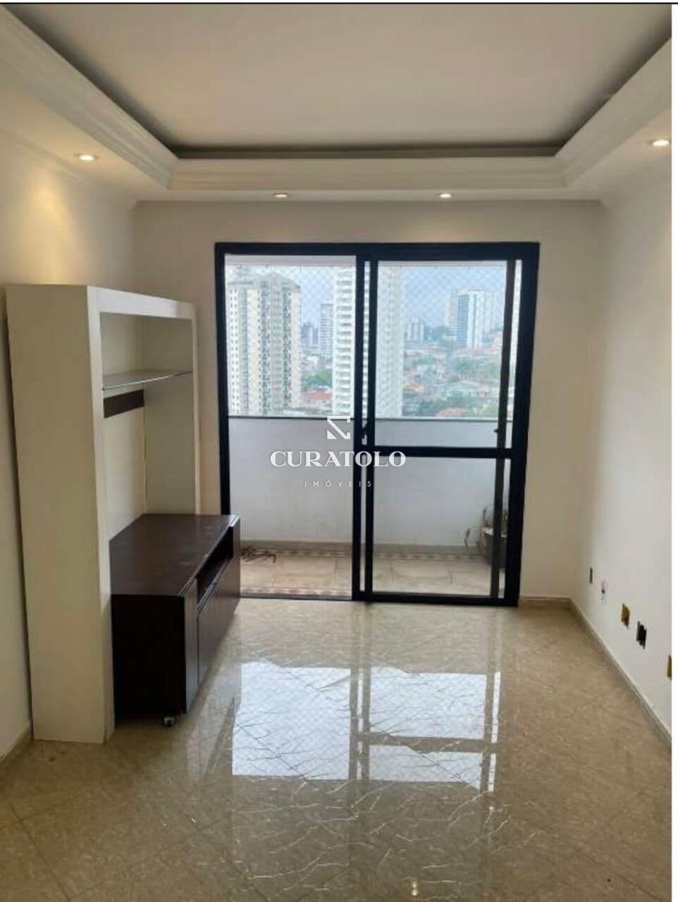 Apartamento à venda com 55 m², 2 quartos, varanda e vaga na Vila Bertioga, São Paulo.
