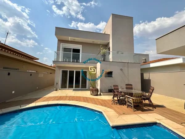 Casa estilo sobrado à venda no condomínio Portal do Parque