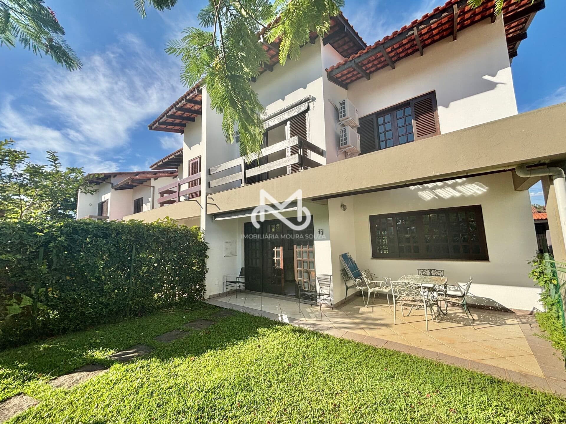 Casa em Villagio à venda no Jardim Indaiá em Bertioga/SP