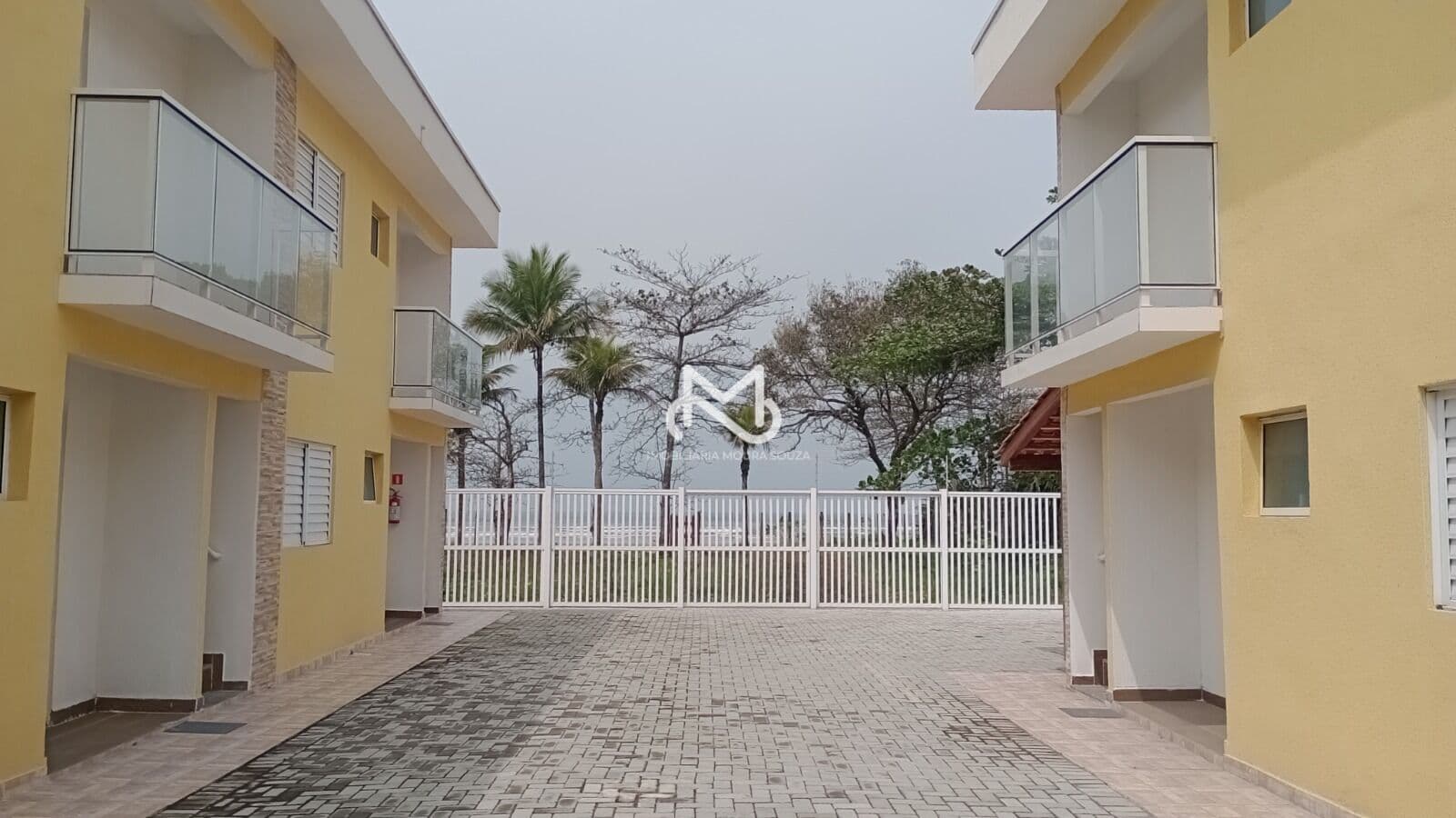 Casa em villagio pé na areia no Jardim Vista Linda, Bertioga/SP