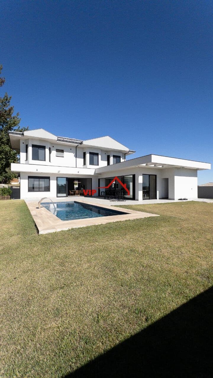 Belíssima casa de Alto Padrão no Condomínio Terras Caxambu com 454m² de área construída