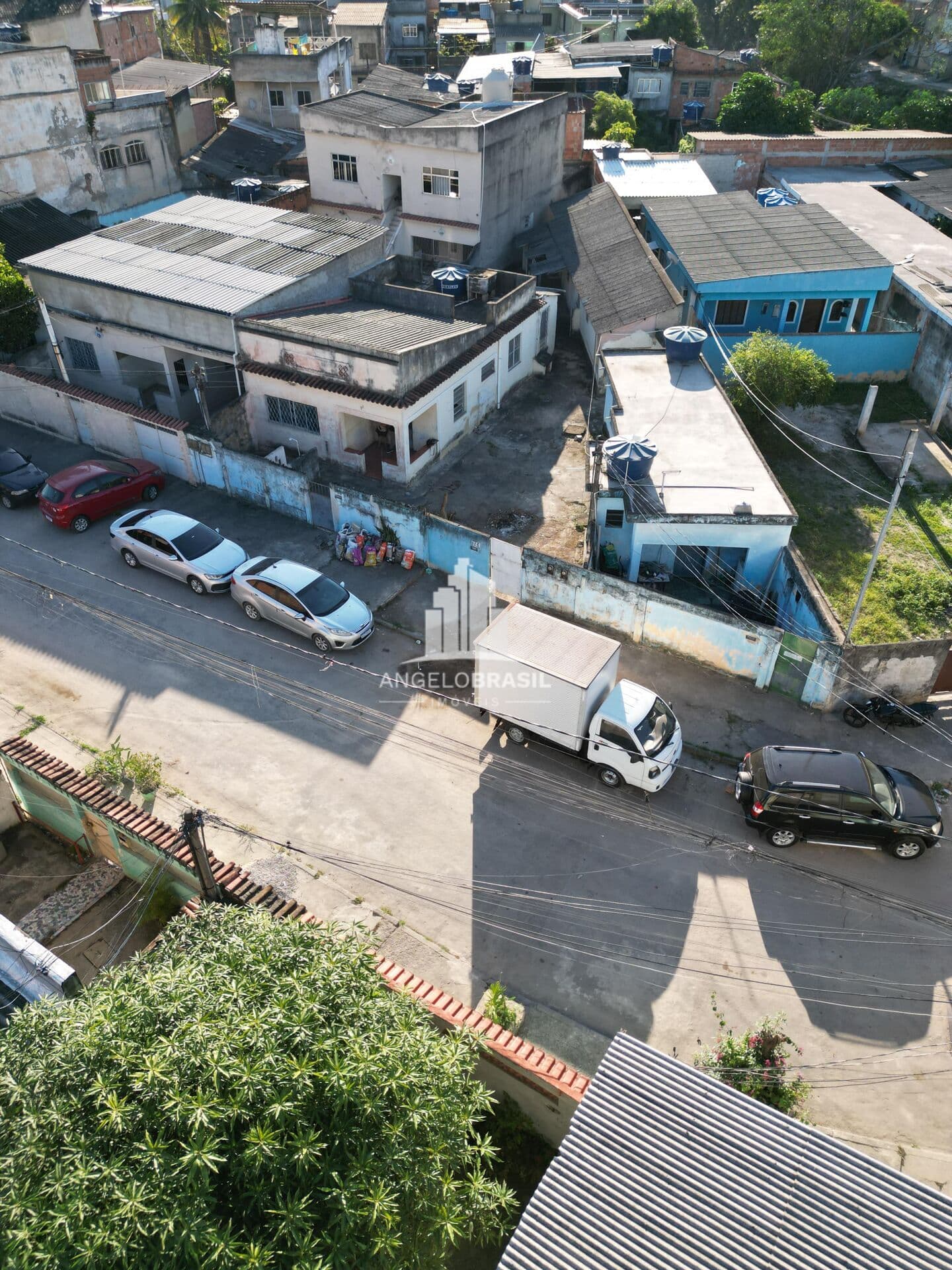 Terreno amplo com 4 casas em Farrula, Belford Roxo