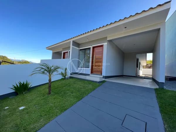 Casa Geminada 3 Dormitórios, sendo 1 Suíte - Lot. Manoel de Melo