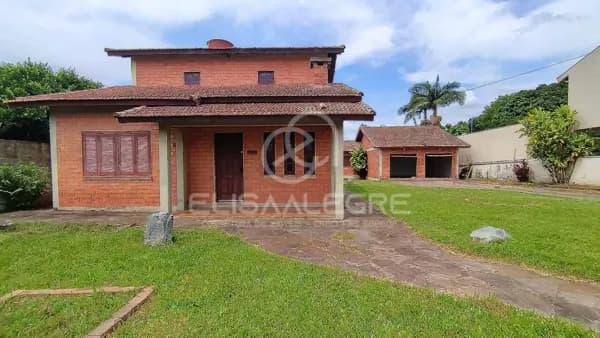 Sobrado + casa auxiliar em terreno de 1.864m² em Esteio
