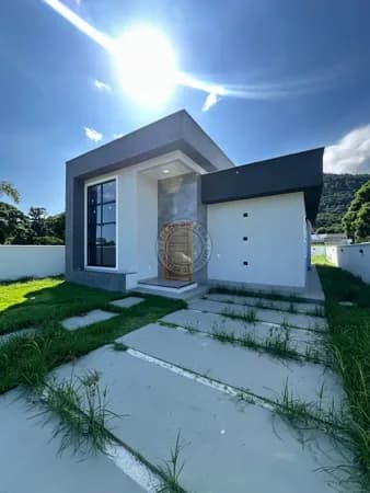 Casa em Condomínio com 3 Suítes e Quintal de 490m² – Conforto e Natureza em Harmonia
