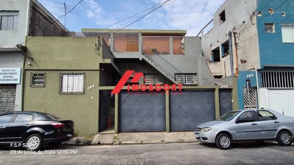 Galpão Salão comercial/ Residencial para venda com 4 casas de aluguel