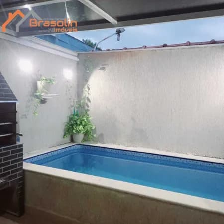 Sobrado 2 suítes piscina individual em Condomínio novo lado praia....