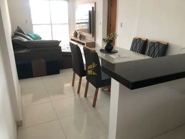 Apartamento com 2 dormitorios e 2 vagas de garagem com vista mar