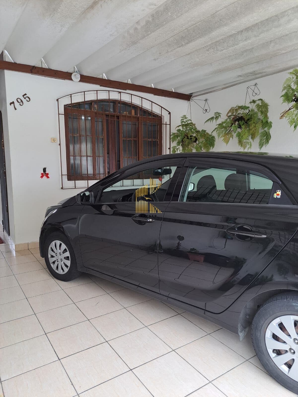 Casa individual à venda no bairro Caiçara em Praia Grande, SP. 2 dormitórios sendo uma suíte