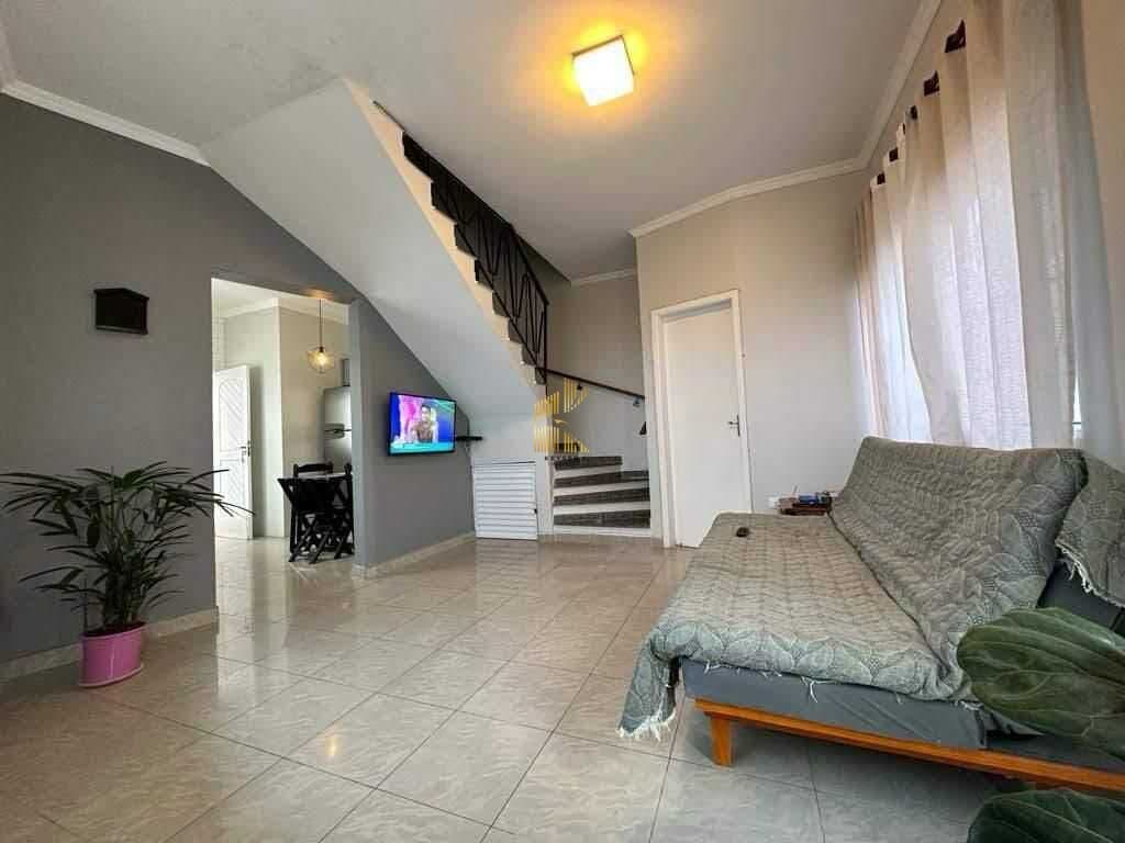 Casa à venda no bairro Caiçara em Praia Grande, SP. 2 dormitórios sendo 2 suítes,