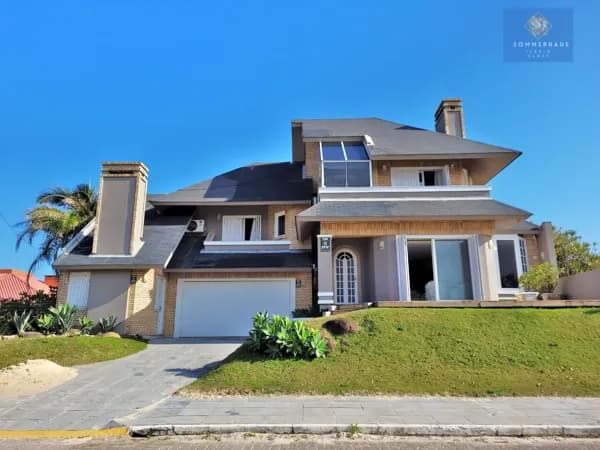Casa 4 dormitórios a beira mar de Atlântida