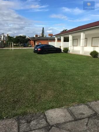 Casa em Atlântida em dois terrenos