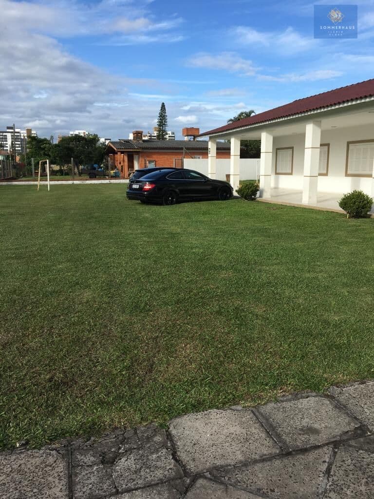 Casa em Atlântida em dois terrenos