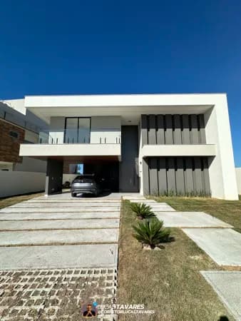 Casa com 4 suítes à venda em Alphaville Litoral Norte com piscina e projeto assinado