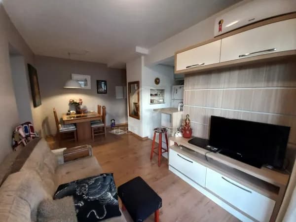 Apartamento Padrão 2 dormitórios SEMI MOBILIADO com suíte, sacada e garagem