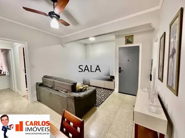 2 quartos na quadra da praia, bairro Ponta da Praia, prédio com elevador e garagem.