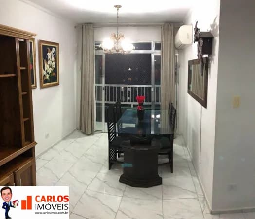 Praia do Gonzaguinha em São Vicente, 2 quartos, sala, cozinha, 2 banheiros e sacada. Prédio com elevador e garagem.