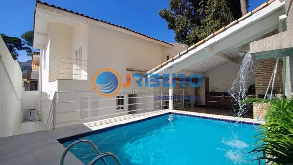 Casa com 4 dormitórios suítes, closet, quintal com piscina e churrasqueira, 4 vagas